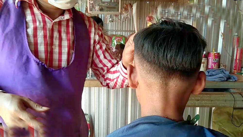 अभिभावकलाई नसोधी कपाल काटेकोमा १० लाख डलर क्षतिपूर्ति माग